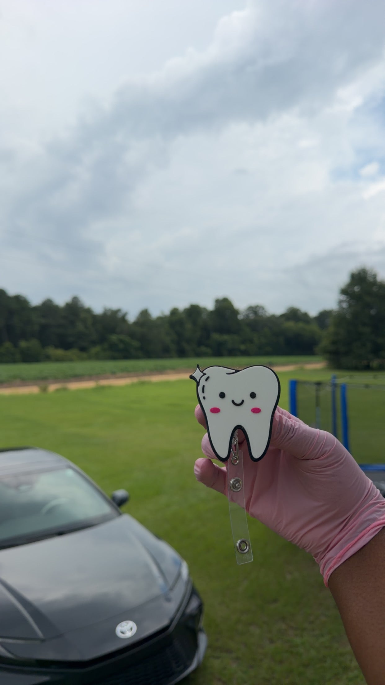 Tooth Badge Reel